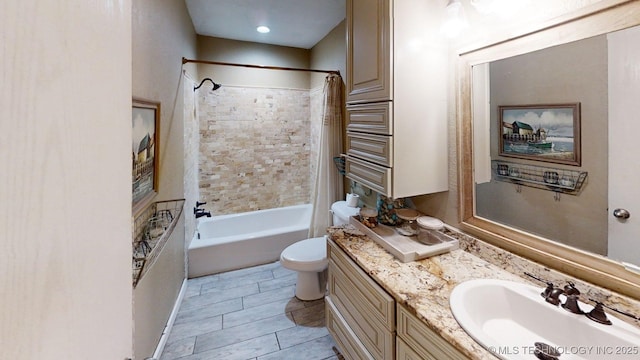 196 High Chaparal St, Ardmore, OK 73401 - bathroom with vanity, toilet, and shower / bath combo