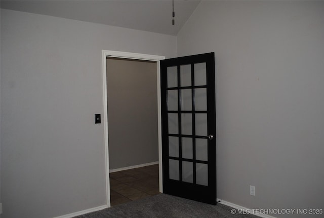 2025 E 134th St S, Bixby, OK 74008 - spare room with lofted ceiling and baseboards
