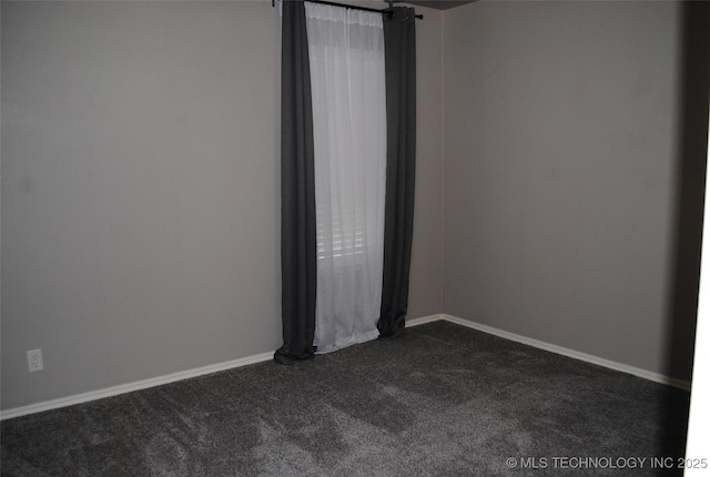 2025 E 134th St S, Bixby, OK 74008 - spare room featuring dark colored carpet and baseboards