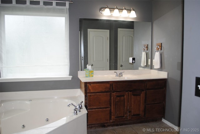 2025 E 134th St S, Bixby, OK 74008 - full bath with a tub with jets, tile patterned floors, and vanity