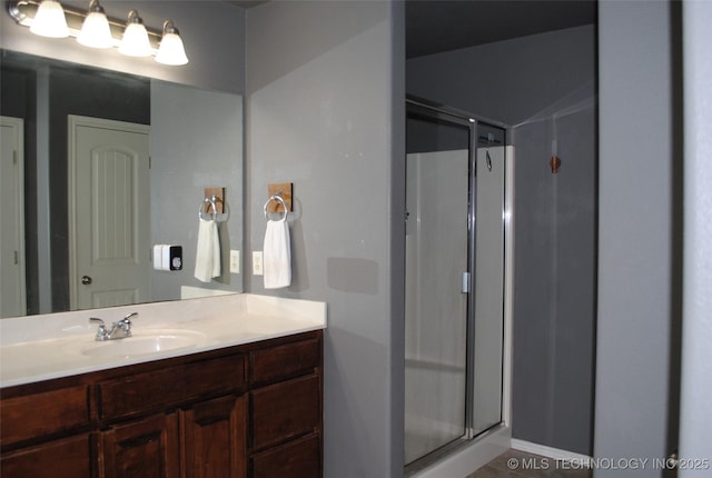 2025 E 134th St S, Bixby, OK 74008 - bathroom featuring a shower stall and vanity
