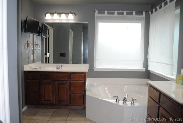 2025 E 134th St S, Bixby, OK 74008 - full bath with a garden tub, vanity, and tile patterned floors
