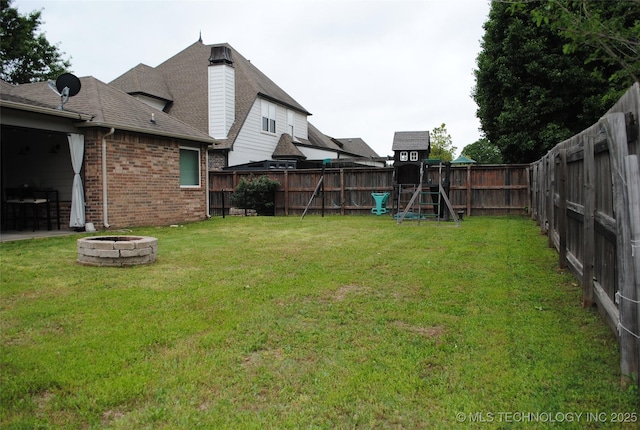 2025 E 134th St S, Bixby, OK 74008 - view of yard featuring a fire pit and a playground