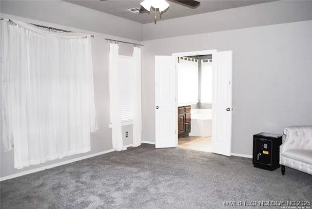 2025 E 134th St S, Bixby, OK 74008 - unfurnished bedroom featuring carpet, ensuite bathroom, and ceiling fan