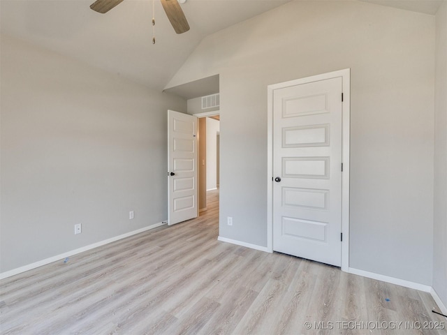 13402 E 124th St, Collinsville, OK 74021 - unfurnished bedroom featuring lofted ceiling, wood finished floors, baseboards, and ceiling fan