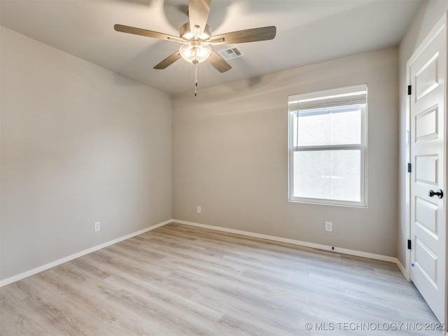 13402 E 124th St, Collinsville, OK 74021 - unfurnished room featuring a ceiling fan, baseboards, and light wood-style flooring