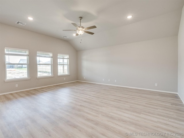13402 E 124th St, Collinsville, OK 74021 - empty room with ceiling fan, lofted ceiling, baseboards, light wood finished floors, and recessed lighting