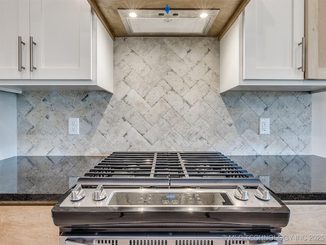 13402 E 124th St, Collinsville, OK 74021 - kitchen featuring stainless steel gas stove, white cabinets, decorative backsplash, and dark stone counters
