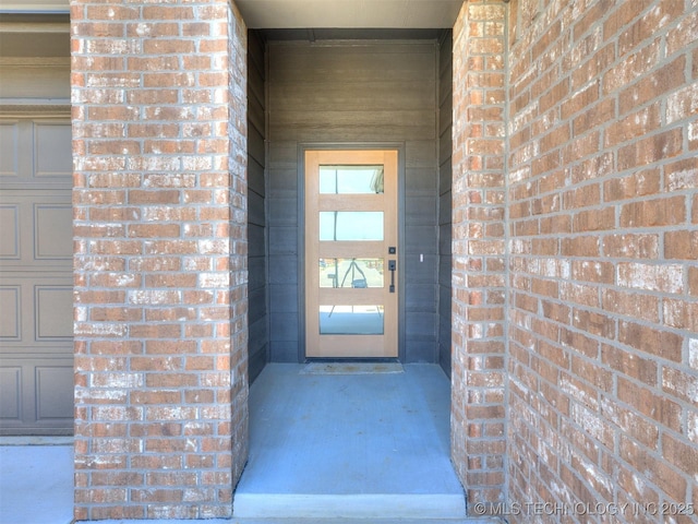 13402 E 124th St, Collinsville, OK 74021 - doorway to property with brick siding