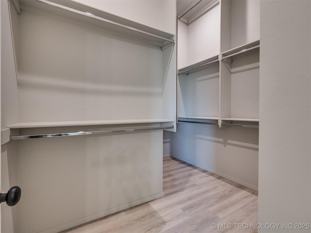 13402 E 124th St, Collinsville, OK 74021 - spacious closet with wood finished floors