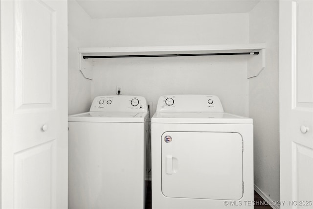 7911 E 66th St Unit 45H, Tulsa, OK 74133 - laundry room with washer and clothes dryer