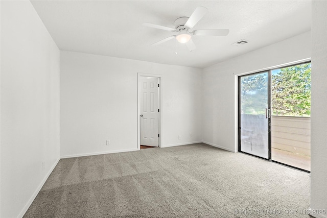 7911 E 66th St Unit 45H, Tulsa, OK 74133 - carpeted spare room featuring ceiling fan and baseboards