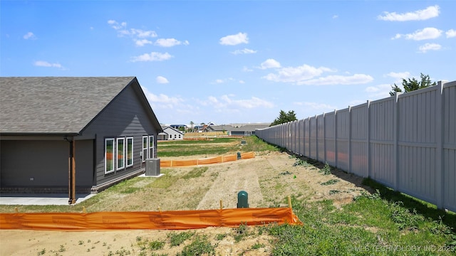 11412 E 93rd Pl, Owasso, OK 74055 - view of yard with central AC