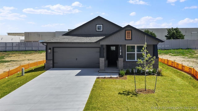 11412 E 93rd Pl, Owasso, OK 74055 - view of front of house featuring a shingled roof, a garage, and concrete driveway