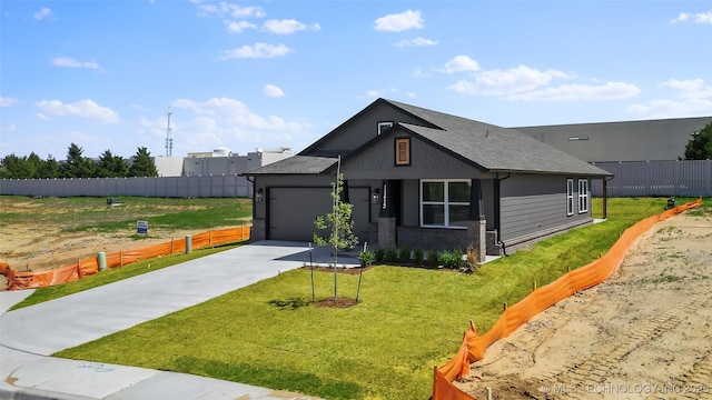 11412 E 93rd Pl, Owasso, OK 74055 - view of front of home with an attached garage, concrete driveway, and a shingled roof