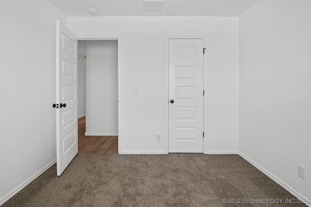 11412 E 93rd Pl, Owasso, OK 74055 - unfurnished bedroom with carpet flooring and baseboards