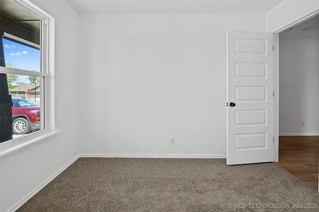 11412 E 93rd Pl, Owasso, OK 74055 - carpeted empty room featuring baseboards