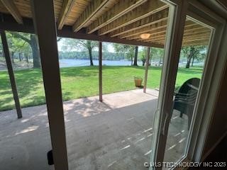 1417 Leisure Rd, Grove, OK 74344 - doorway to outside featuring a water view and plenty of natural light