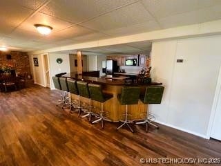 1417 Leisure Rd, Grove, OK 74344 - indoor dry bar featuring wood finished floors and baseboards