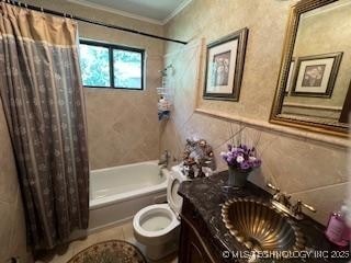 1417 Leisure Rd, Grove, OK 74344 - bathroom with crown molding, shower / bathtub combination with curtain, toilet, and vanity