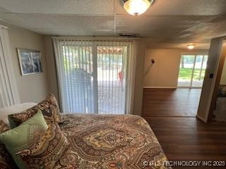 1417 Leisure Rd, Grove, OK 74344 - bedroom featuring wood finished floors