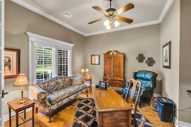 10942 S 93rd E Ave, Bixby, OK 74133 - living room with wood finished floors, ornamental molding, ceiling fan, and baseboards