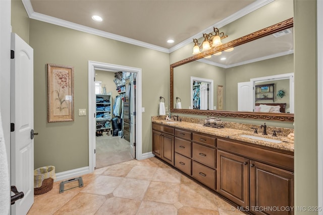 10942 S 93rd E Ave, Bixby, OK 74133 - full bath with ornamental molding, baseboards, double vanity, a spacious closet, and recessed lighting