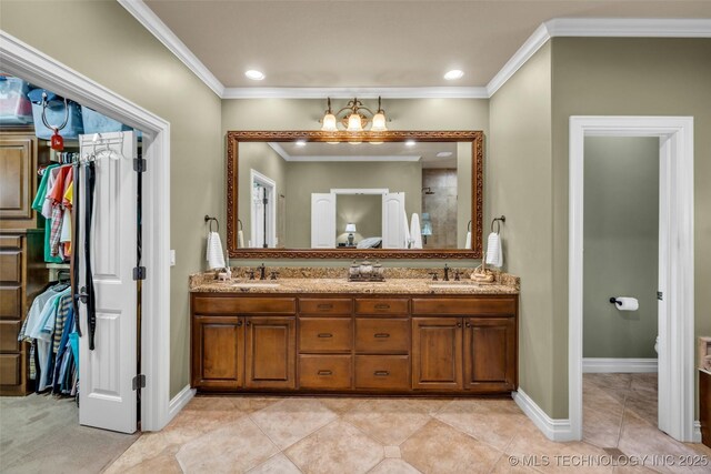 10942 S 93rd E Ave, Bixby, OK 74133 - bathroom with crown molding, double vanity, baseboards, a tile shower, and a chandelier