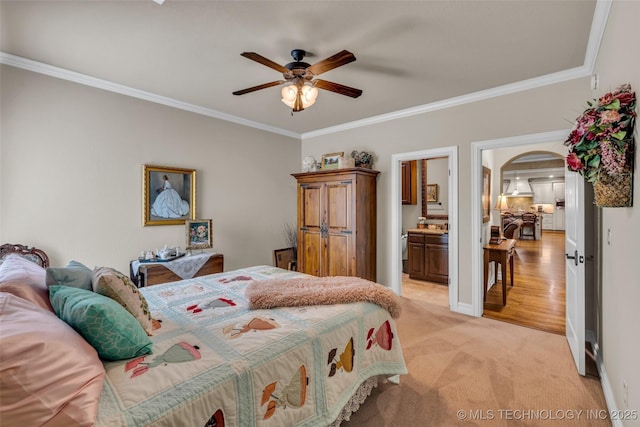 10942 S 93rd E Ave, Bixby, OK 74133 - bedroom featuring ornamental molding, light colored carpet, arched walkways, ceiling fan, and connected bathroom