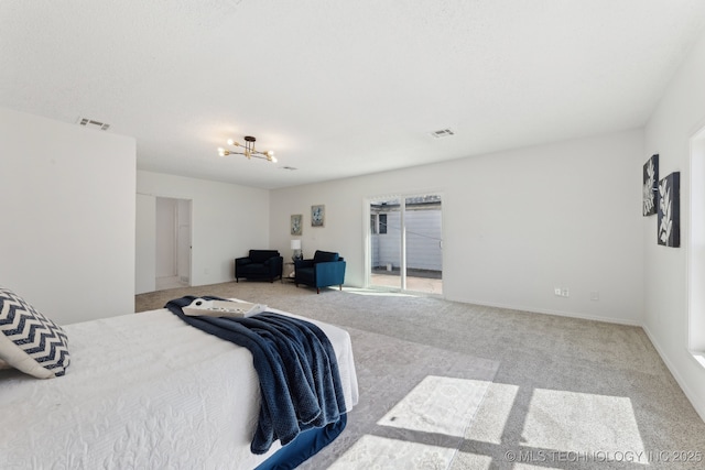 523 W Toledo Pl, Broken Arrow, OK 74012 - carpeted bedroom featuring a chandelier