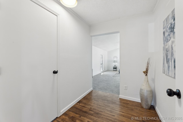 523 W Toledo Pl, Broken Arrow, OK 74012 - corridor featuring wood finished floors, baseboards, crown molding, and a textured ceiling