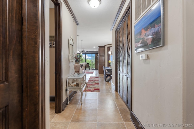 25 Grand Lake Dr Unit 3B, Afton, OK 74331 - hallway featuring baseboards and light tile patterned floors