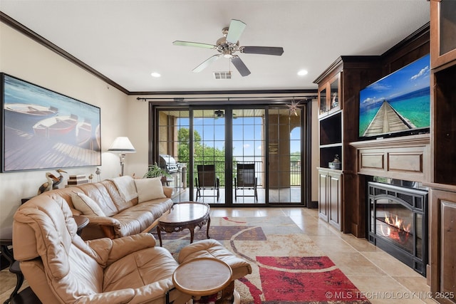 25 Grand Lake Dr Unit 3B, Afton, OK 74331 - living area with crown molding, a glass covered fireplace, a ceiling fan, recessed lighting, and light tile patterned flooring
