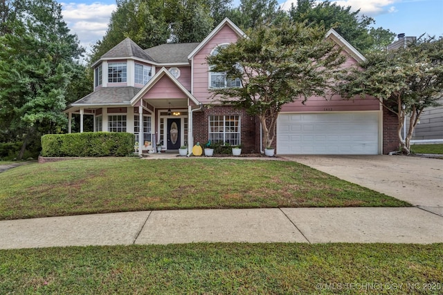 traditional-style house featuring brick siding, driveway, and a front lawn