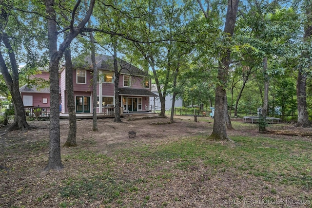 back of house with covered porch