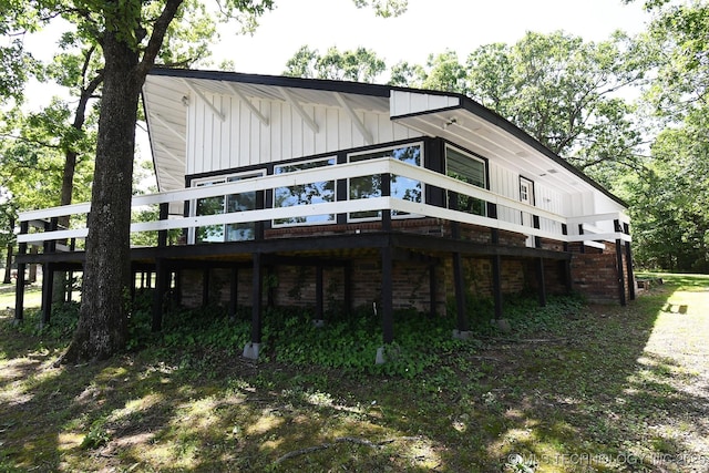 96358 S 4531, Vian, OK 74962 - rear view of property featuring a wooden deck and board and batten siding