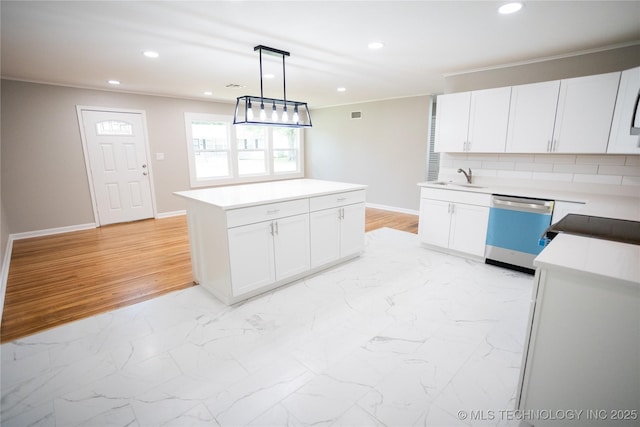 4024 E 25th St, Tulsa, OK 74114 - kitchen featuring dishwashing machine, a sink, recessed lighting, white cabinets, and light countertops