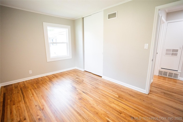 4024 E 25th St, Tulsa, OK 74114 - unfurnished room with ornamental molding, light wood-style flooring, and baseboards