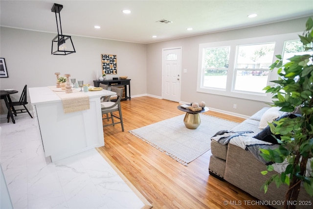4024 E 25th St, Tulsa, OK 74114 - living room with recessed lighting, baseboards, and ornamental molding