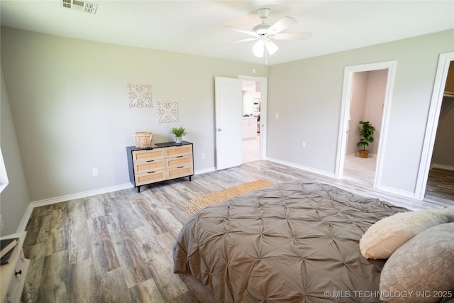 4024 E 25th St, Tulsa, OK 74114 - bedroom featuring wood finished floors, baseboards, and ceiling fan