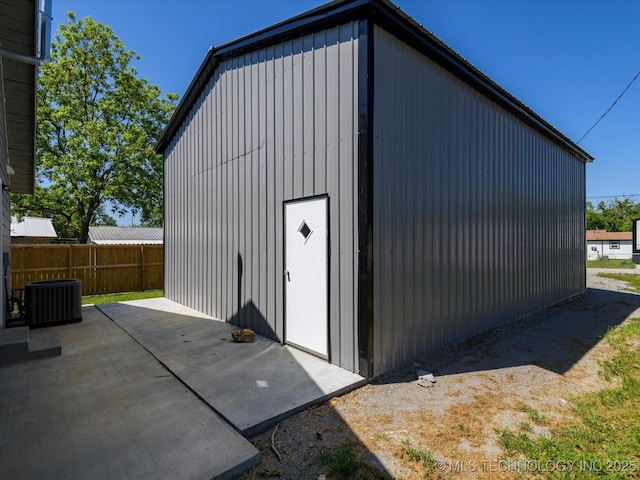 241 NE Debell Ave, Bartlesville, OK 74006 - view of outdoor structure featuring central AC unit
