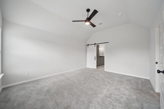 1305 N Dogwood Ave, Broken Arrow, OK 74012 - unfurnished bedroom featuring lofted ceiling, carpet, baseboards, a ceiling fan, and ensuite bathroom