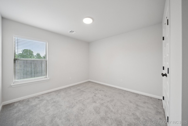 1305 N Dogwood Ave, Broken Arrow, OK 74012 - carpeted empty room with baseboards