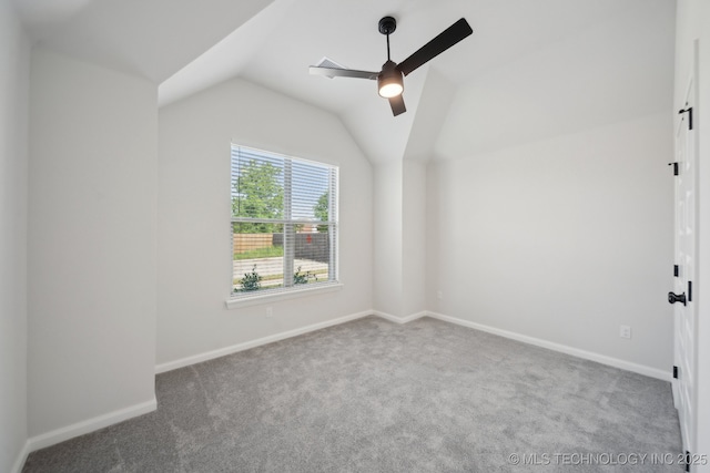 1305 N Dogwood Ave, Broken Arrow, OK 74012 - carpeted spare room featuring a ceiling fan, vaulted ceiling, and baseboards