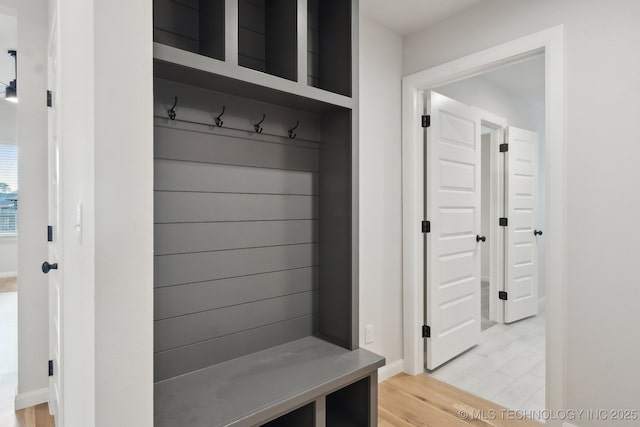 1305 N Dogwood Ave, Broken Arrow, OK 74012 - mudroom featuring light wood-style floors and baseboards