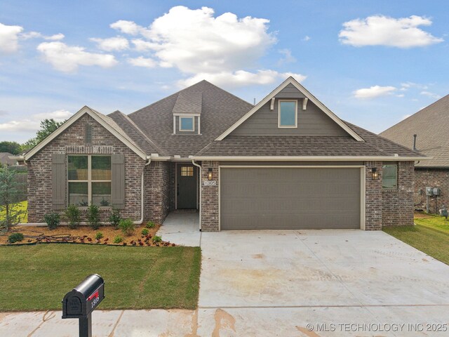 1305 N Dogwood Ave, Broken Arrow, OK 74012 - view of front of property featuring brick siding, a garage, a shingled roof, concrete driveway, and a front lawn