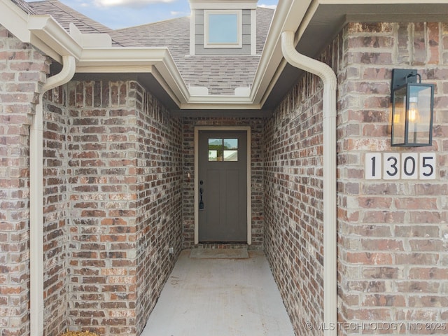 1305 N Dogwood Ave, Broken Arrow, OK 74012 - entrance to property with brick siding and a shingled roof