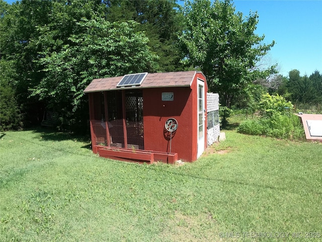 808 N Norfolk Rd, Yale, OK 74085 - view of poultry coop featuring a lawn