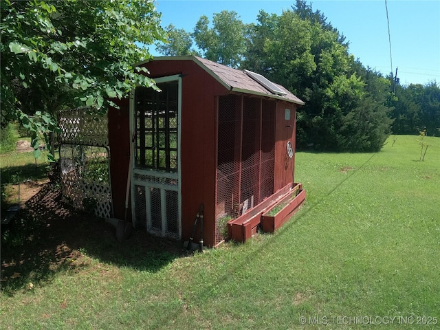 808 N Norfolk Rd, Yale, OK 74085 - view of poultry coop with a yard
