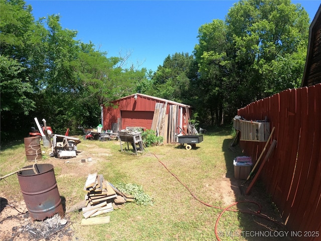 808 N Norfolk Rd, Yale, OK 74085 - view of yard featuring a garage and an outdoor structure